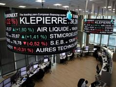 European Stocks Slip as Earnings Wave Hits